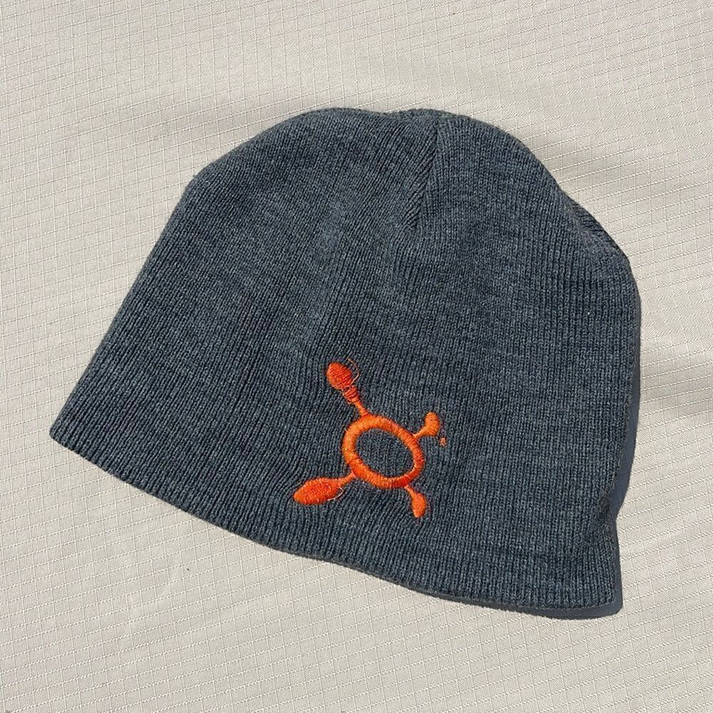 OrangeTheory Acrylic Beanie. Grey withโOrange embroideredโlogo